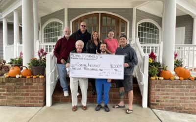 Organizers of the Michael J. Strawley, Sr. Memorial Golf Tournament presented a check for $12,000
